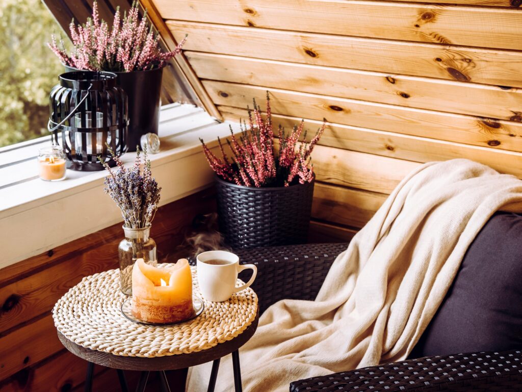 Affordable Luxury accessories styled in a reading corner with specific autumn undertones and trends for 2025