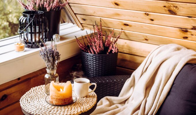 Affordable Luxury accessories styled in a reading corner with specific autumn undertones and trends for 2025